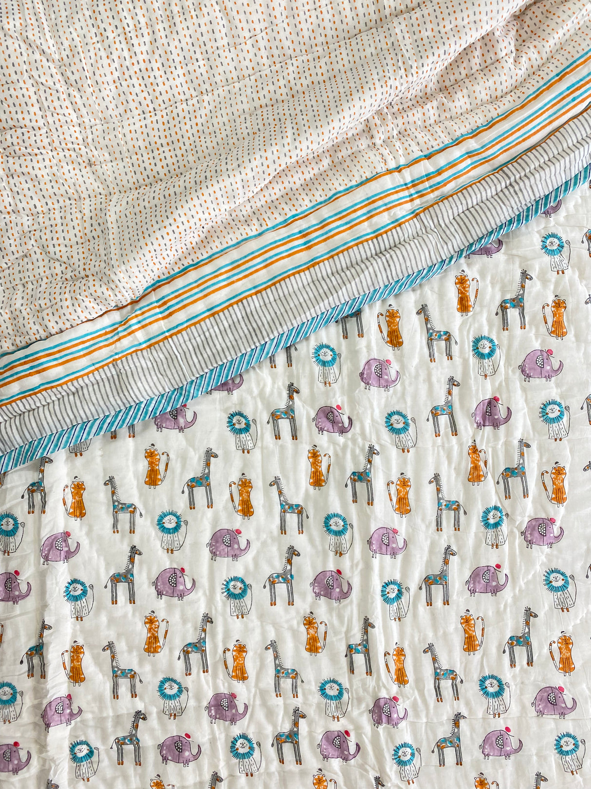 jungle animals print quilt for babies made with azo free dyes in India for global resellers and gift hampers