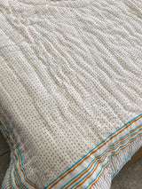jungle theme quilt for kids in breathable cotton handmade by Jaipur artisans for gifting and retail in USA and UK