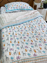 breathable pure cotton zoo theme toddler quilt for boys and girls crafted in India for bulk gifting and export