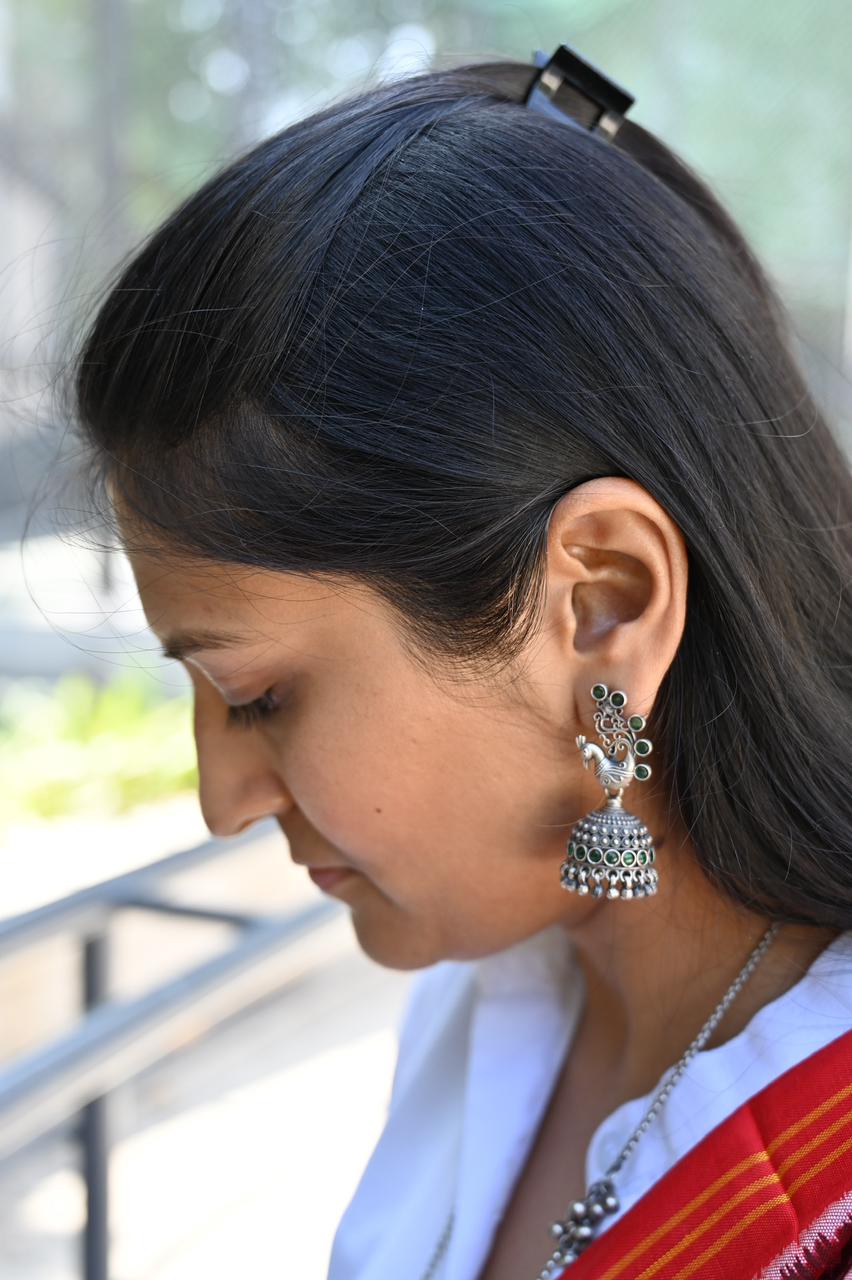 Handcrafted Peacock Silver Jhumkis with Green Beads