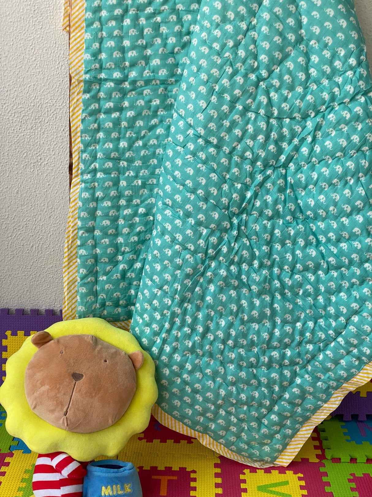 mulmul baby quilt with adorable zoo characters suitable for nursery decor and gifting in UK and UAE
